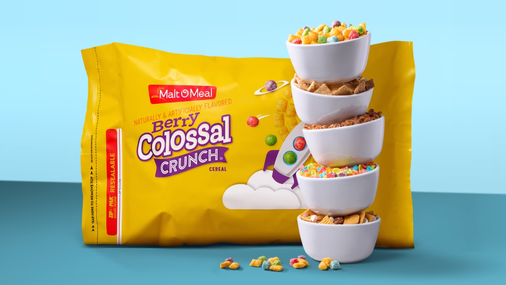 Berry Colossal Crunch Cereal packaging and stacked bowls